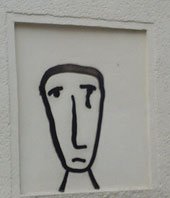 traurigesgesicht-kuhstraße streetart face